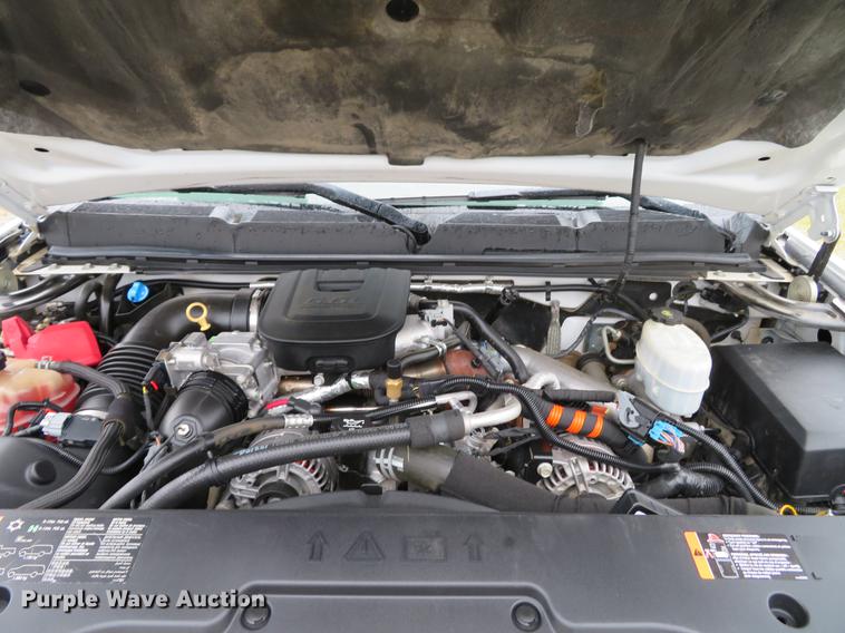 image for item DE5069 2013 Chevrolet Silverado 3500HD Ext. Cab flatbed pickup truck