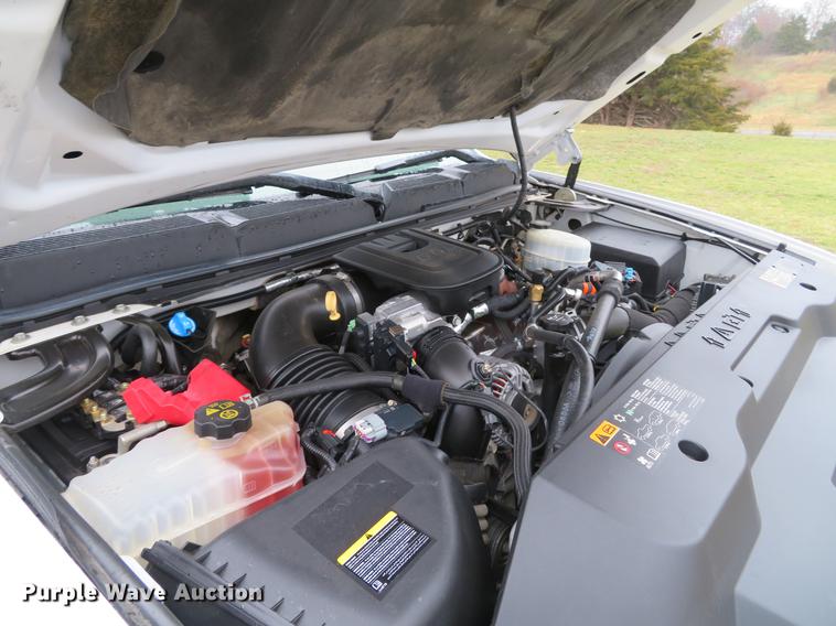 image for item DE5069 2013 Chevrolet Silverado 3500HD Ext. Cab flatbed pickup truck