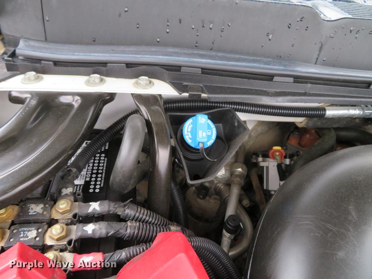 image for item DE5069 2013 Chevrolet Silverado 3500HD Ext. Cab flatbed pickup truck