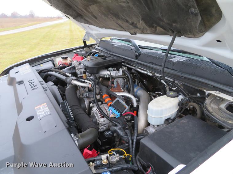 image for item DE5069 2013 Chevrolet Silverado 3500HD Ext. Cab flatbed pickup truck