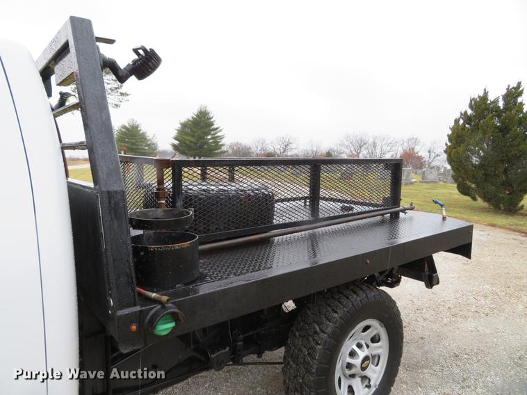 image for item DE5069 2013 Chevrolet Silverado 3500HD Ext. Cab flatbed pickup truck