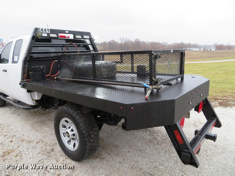 image for item DE5069 2013 Chevrolet Silverado 3500HD Ext. Cab flatbed pickup truck