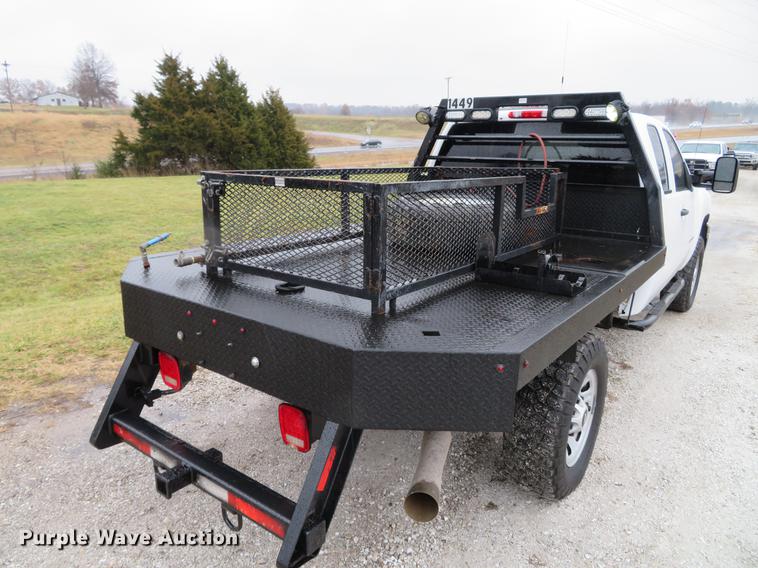 image for item DE5069 2013 Chevrolet Silverado 3500HD Ext. Cab flatbed pickup truck