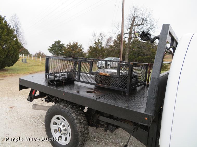 image for item DE5069 2013 Chevrolet Silverado 3500HD Ext. Cab flatbed pickup truck