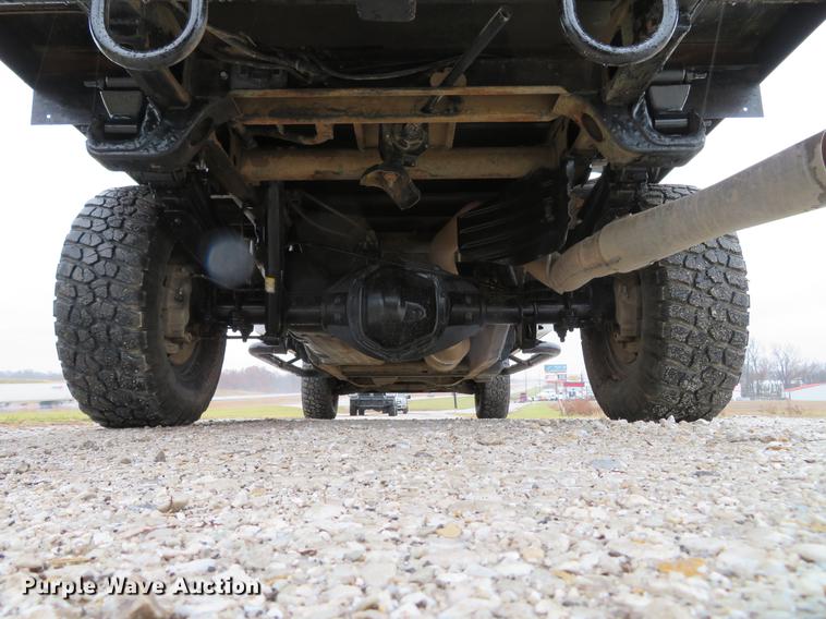 image for item DE5069 2013 Chevrolet Silverado 3500HD Ext. Cab flatbed pickup truck