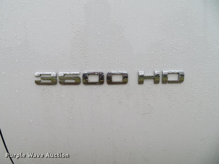 image for item DE5069 2013 Chevrolet Silverado 3500HD Ext. Cab flatbed pickup truck