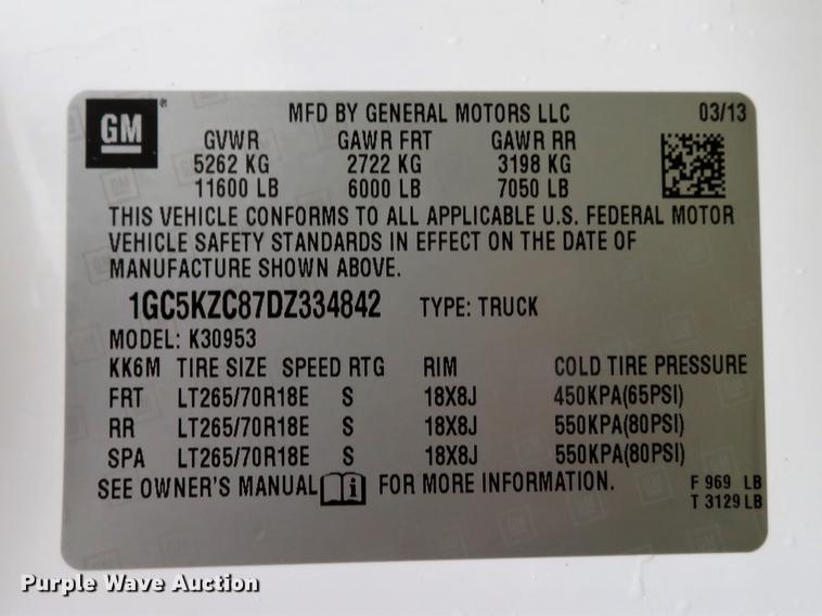 image for item DE5069 2013 Chevrolet Silverado 3500HD Ext. Cab flatbed pickup truck