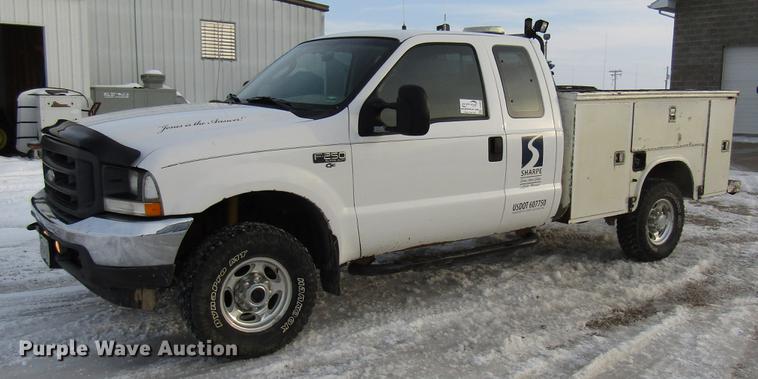 image for item DE5938 2004 Ford F250 Super Duty SuperCab utility bed pickup truck
