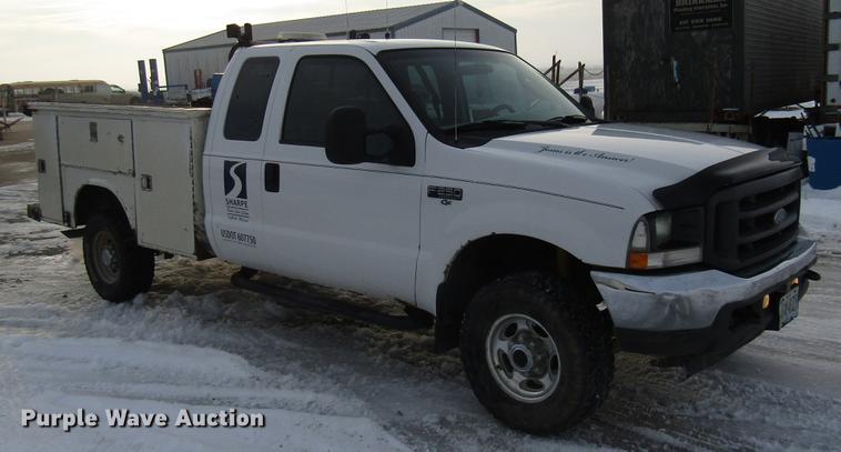 image for item DE5938 2004 Ford F250 Super Duty SuperCab utility bed pickup truck