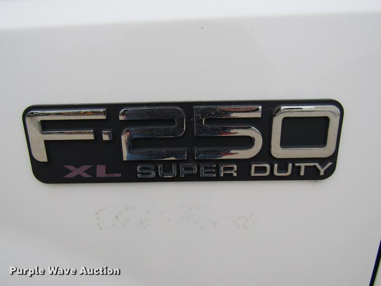 image for item DE5957 2000 Ford F250 Super Duty XL utility bed pickup truck