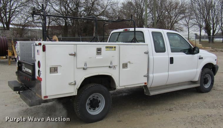 image for item DE5959 1999 Ford F350 Super Duty XL SuperCab utility bed pickup truck