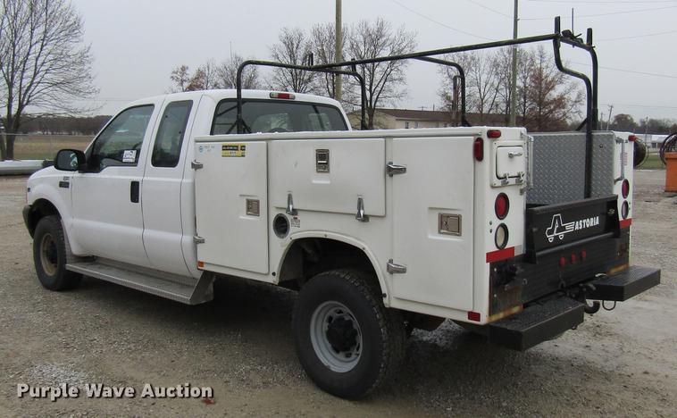 image for item DE5959 1999 Ford F350 Super Duty XL SuperCab utility bed pickup truck