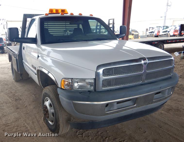 image for item EW9531 2002 Dodge Ram 3500 Laramie SLT flatbed pickup truck
