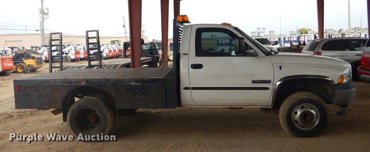 image for item EW9531 2002 Dodge Ram 3500 Laramie SLT flatbed pickup truck