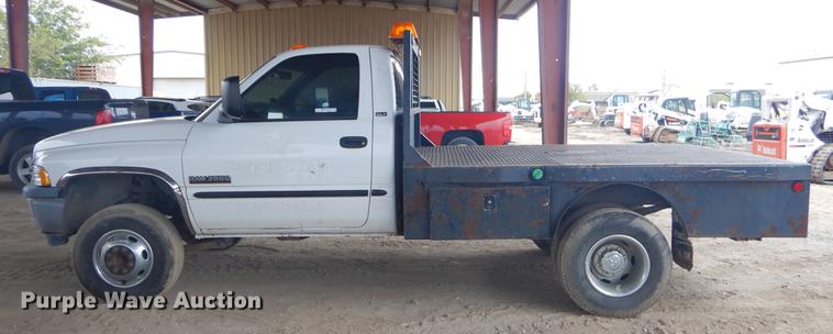 image for item EW9531 2002 Dodge Ram 3500 Laramie SLT flatbed pickup truck