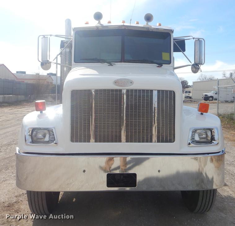 image for item EW9731 1999 Peterbilt 330 roll-off container truck