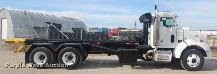 image for item EW9731 1999 Peterbilt 330 roll-off container truck
