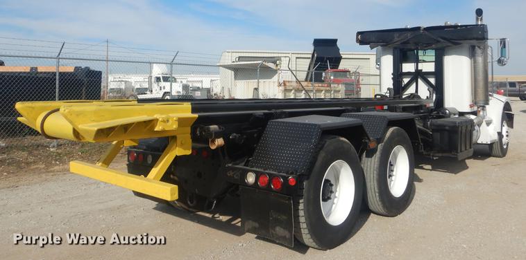 image for item EW9731 1999 Peterbilt 330 roll-off container truck