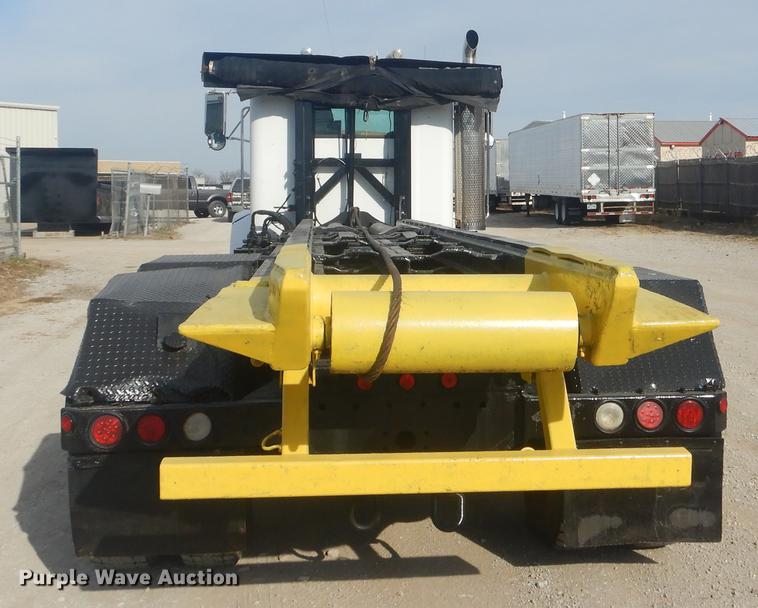 image for item EW9731 1999 Peterbilt 330 roll-off container truck