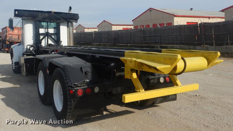 image for item EW9731 1999 Peterbilt 330 roll-off container truck
