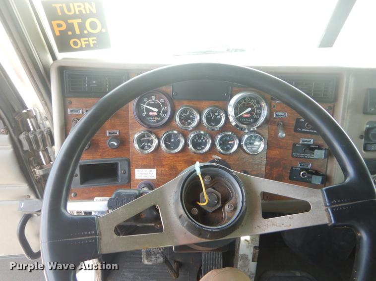 image for item EW9731 1999 Peterbilt 330 roll-off container truck