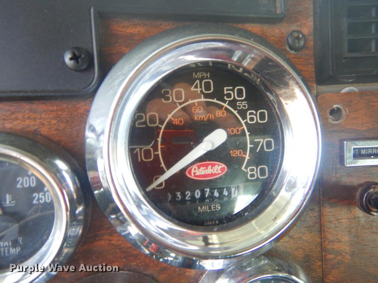 image for item EW9731 1999 Peterbilt 330 roll-off container truck