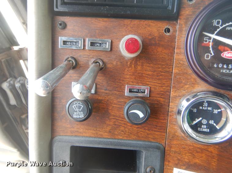 image for item EW9731 1999 Peterbilt 330 roll-off container truck