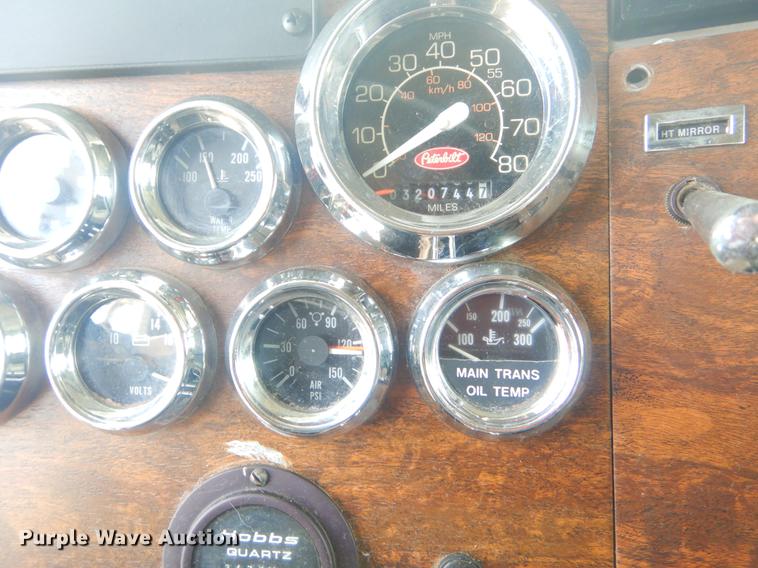 image for item EW9731 1999 Peterbilt 330 roll-off container truck