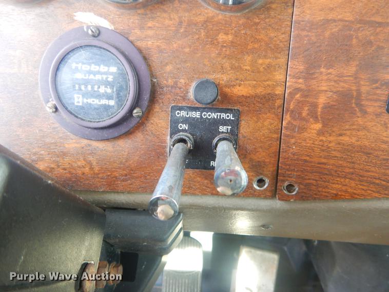 image for item EW9731 1999 Peterbilt 330 roll-off container truck