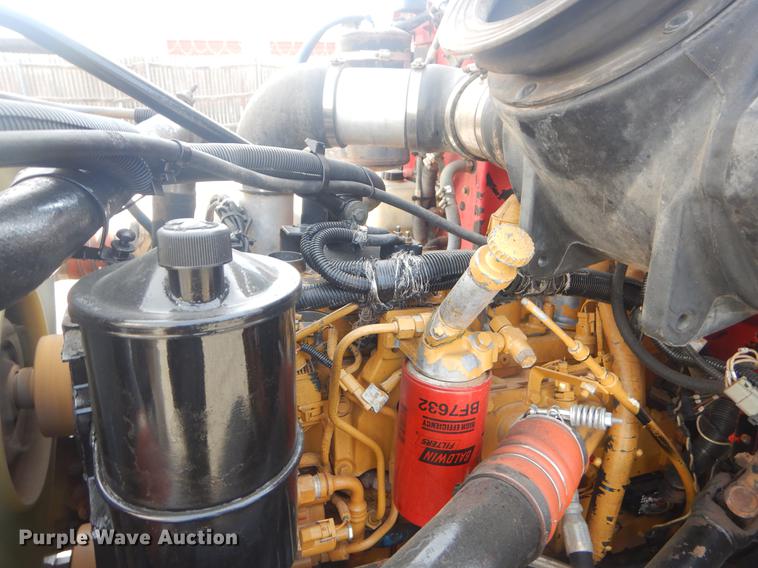 image for item EW9731 1999 Peterbilt 330 roll-off container truck