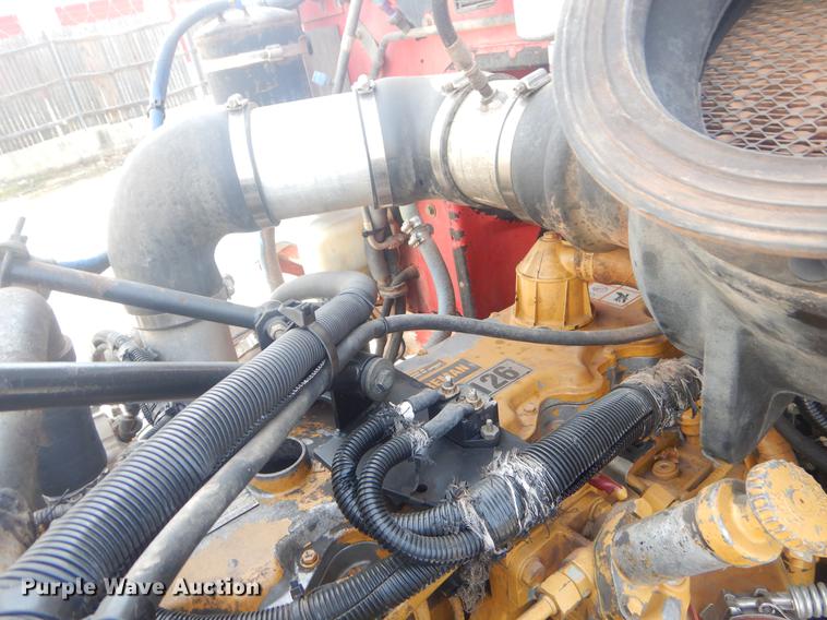 image for item EW9731 1999 Peterbilt 330 roll-off container truck