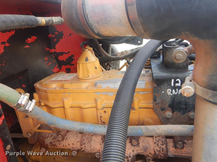 image for item EW9731 1999 Peterbilt 330 roll-off container truck