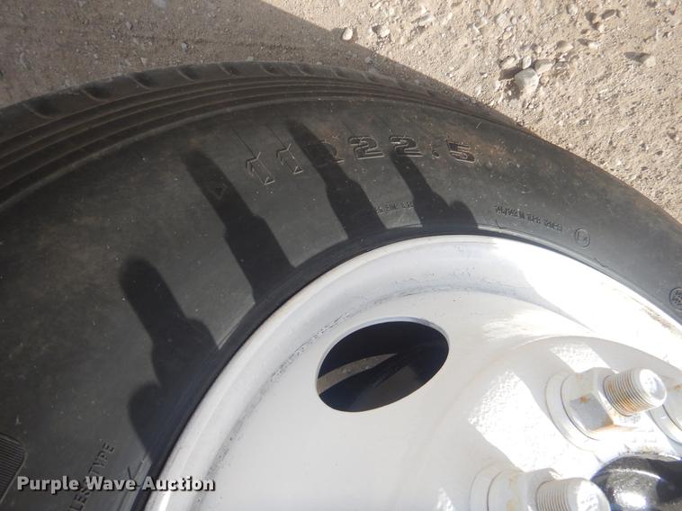 image for item EW9731 1999 Peterbilt 330 roll-off container truck