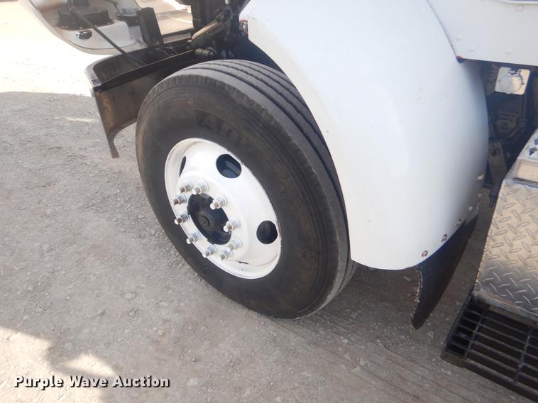 image for item EW9731 1999 Peterbilt 330 roll-off container truck