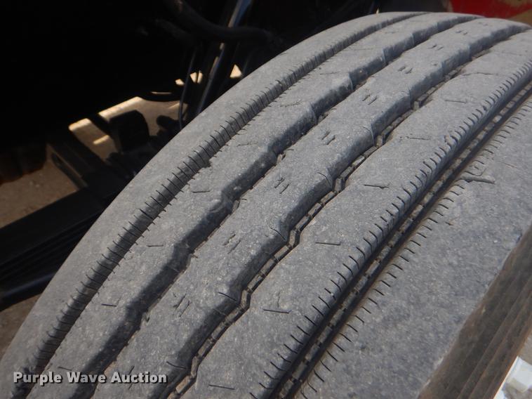 image for item EW9731 1999 Peterbilt 330 roll-off container truck