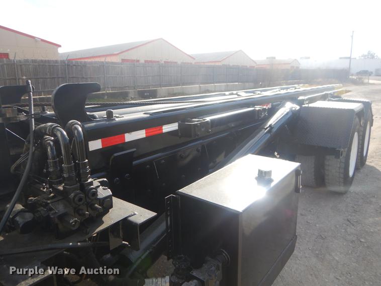 image for item EW9731 1999 Peterbilt 330 roll-off container truck