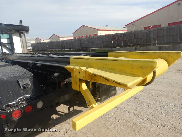 image for item EW9731 1999 Peterbilt 330 roll-off container truck