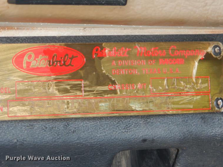 image for item EW9731 1999 Peterbilt 330 roll-off container truck