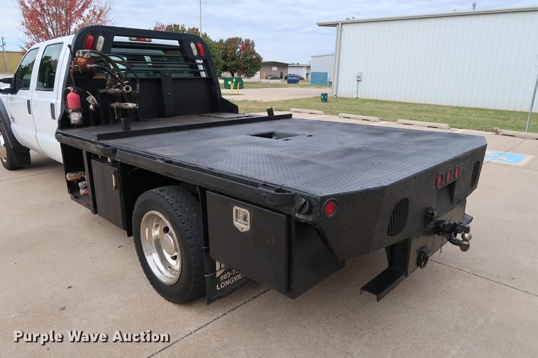 image for item FE9540 2011 Ford F550 Crew Cab flatbed truck