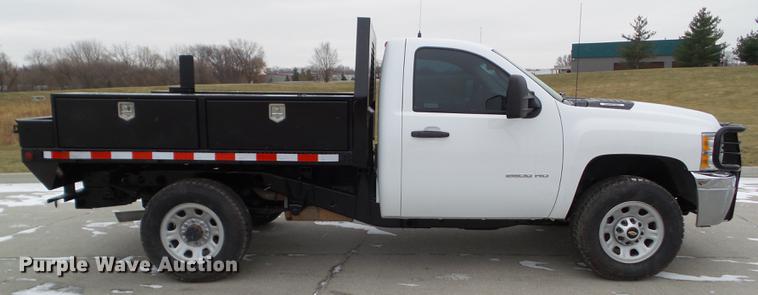 image for item L5729 2012 Chevrolet Silverado 2500HD flatbed pickup truck