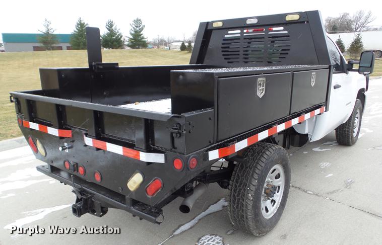 image for item L5729 2012 Chevrolet Silverado 2500HD flatbed pickup truck