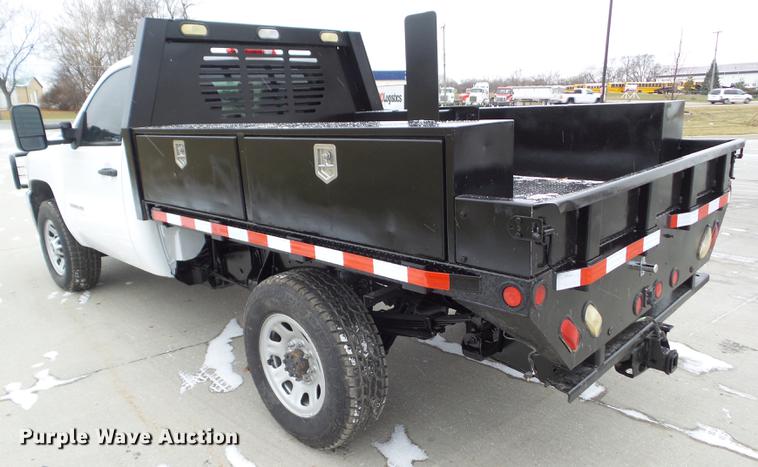 image for item L5729 2012 Chevrolet Silverado 2500HD flatbed pickup truck