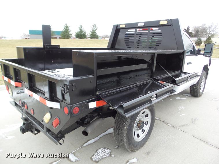 image for item L5729 2012 Chevrolet Silverado 2500HD flatbed pickup truck