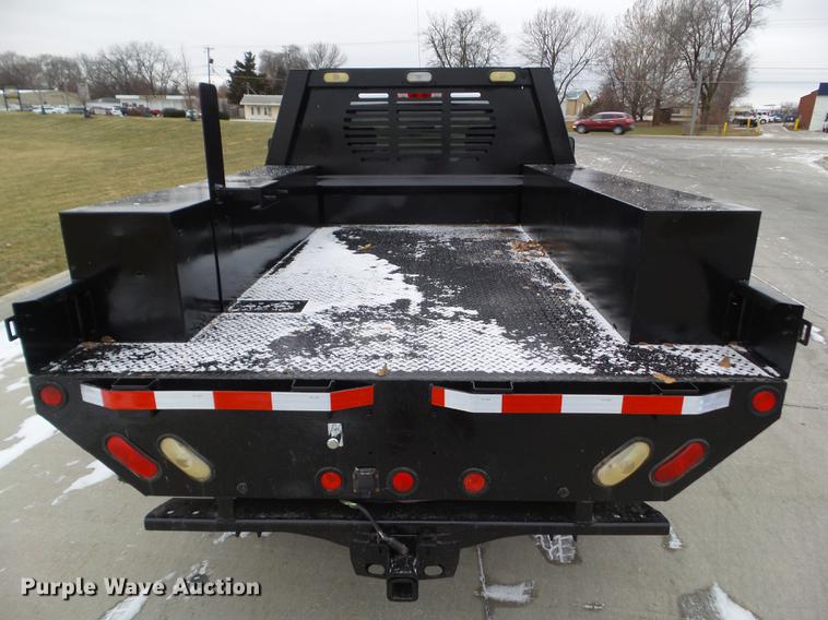 image for item L5729 2012 Chevrolet Silverado 2500HD flatbed pickup truck