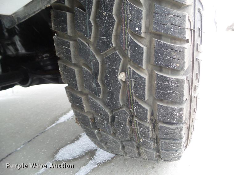 image for item L5729 2012 Chevrolet Silverado 2500HD flatbed pickup truck