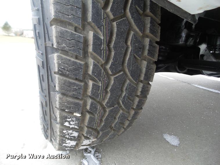 image for item L5729 2012 Chevrolet Silverado 2500HD flatbed pickup truck