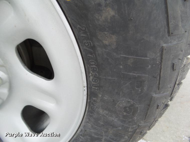 image for item L5729 2012 Chevrolet Silverado 2500HD flatbed pickup truck