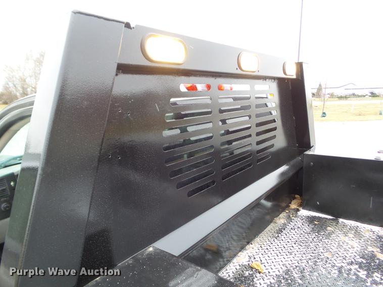 image for item L5729 2012 Chevrolet Silverado 2500HD flatbed pickup truck