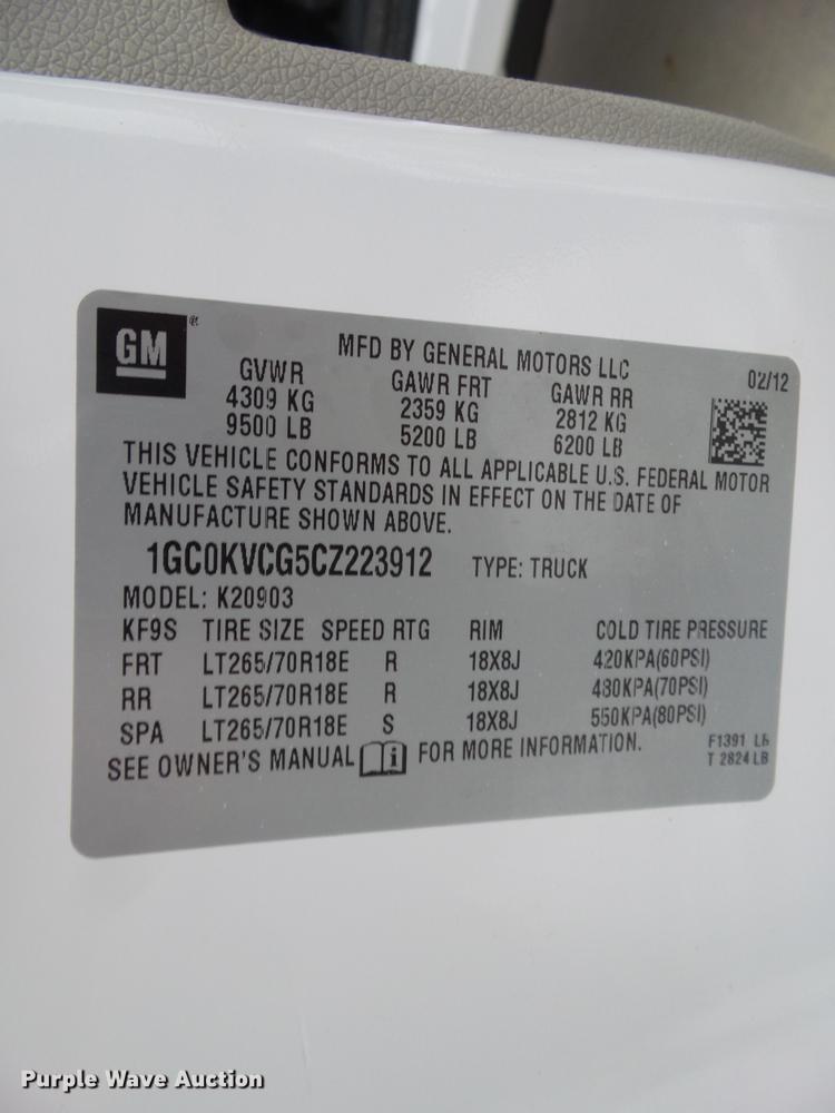 image for item L5729 2012 Chevrolet Silverado 2500HD flatbed pickup truck