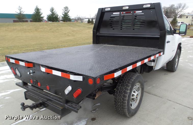image for item L5730 2013 Chevrolet Silverado 2500HD flatbed pickup truck